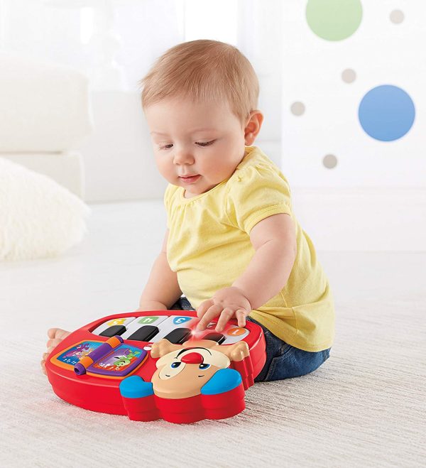 jucarie_pentru_bebelusi_fisher_price_laugh_and_leran_pianul_catelusului_4.jpg Jucarie pentru bebelusi Fisher Price Laugh and Leran pianul catelusului