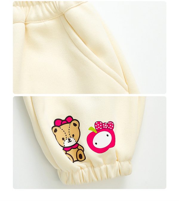 Compleu-Crem-Fetite-Bluza-Rosie-si-Pantaloni.jpg Compleu Crem Fetițe Bluză Roșie și Pantaloni cu Hello Kitty - 18-24 luni